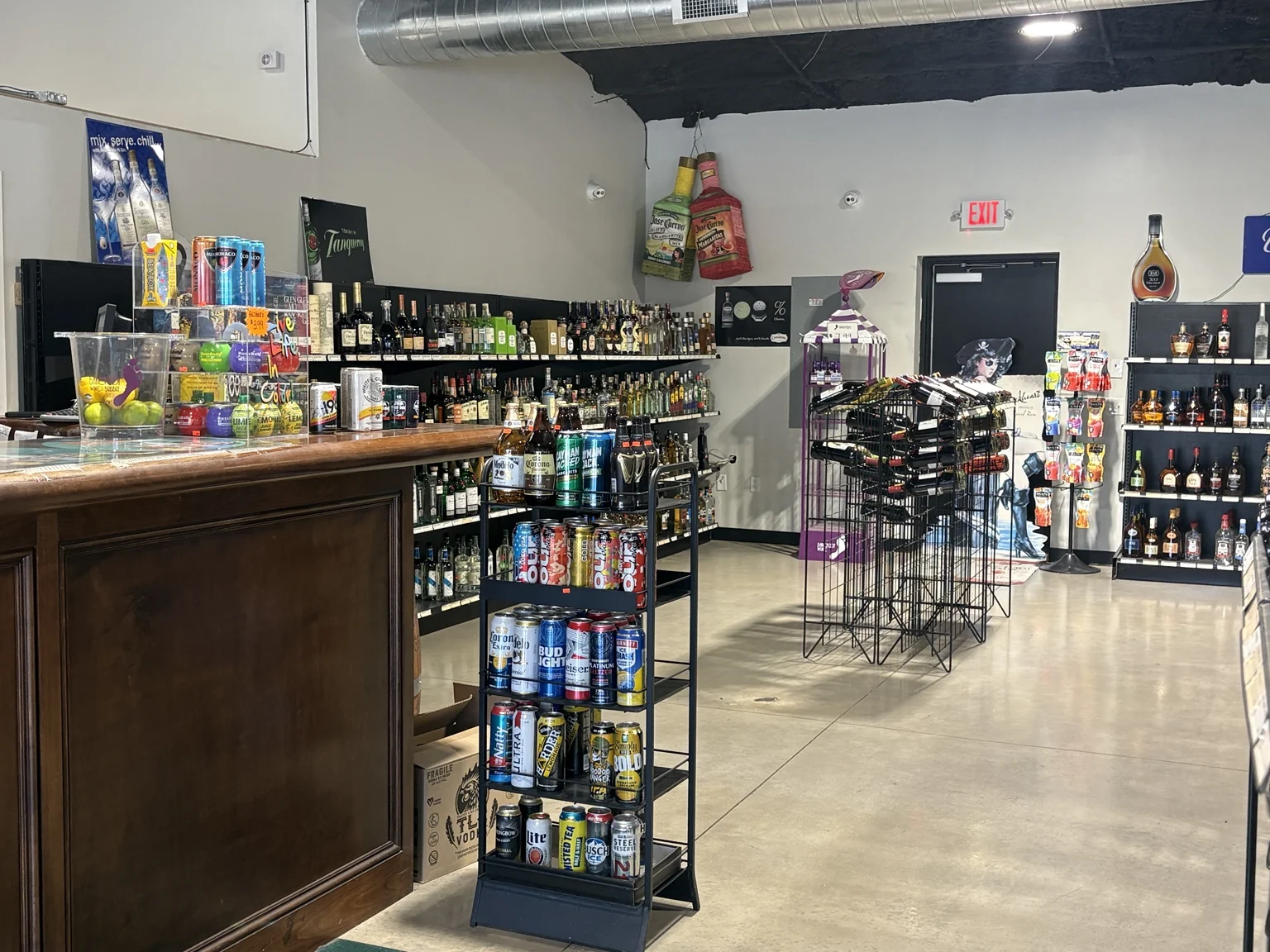 The checkout counter and nearby displays of mixers and drinks