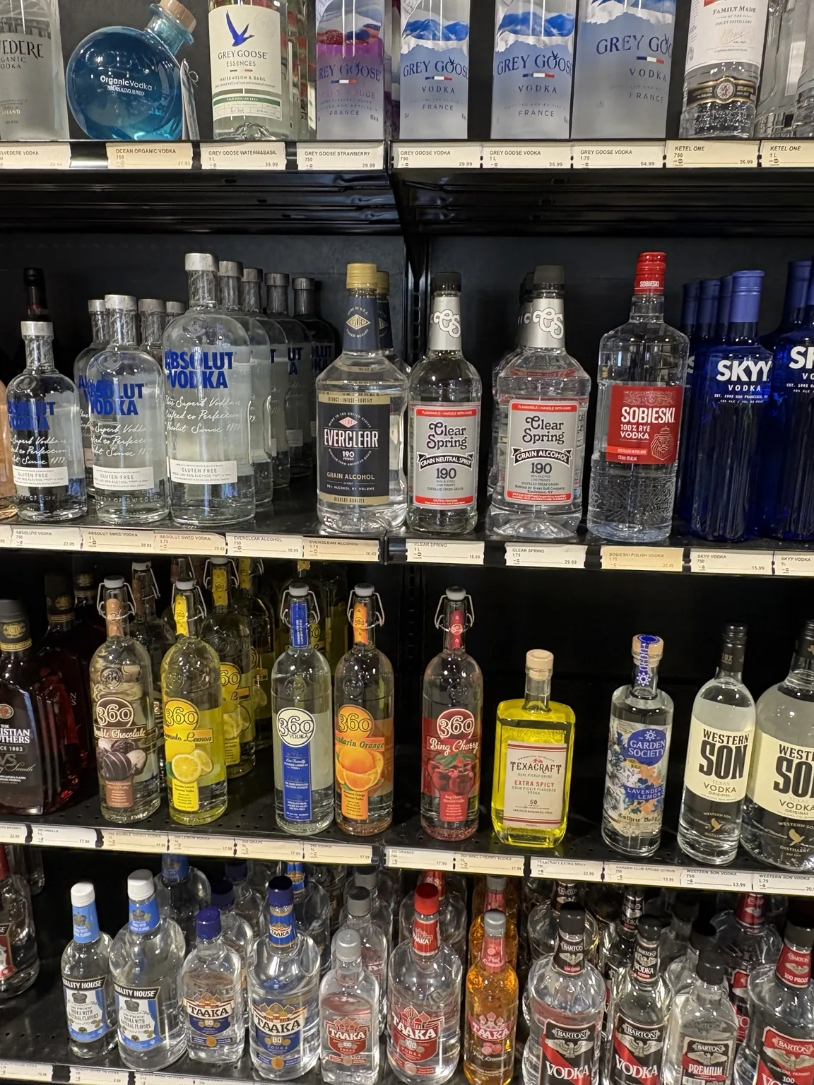 Grey Goose, Absolut and SKYY vodka above flavored vodkas at One Stop Liquor in Bethany, Oklahoma