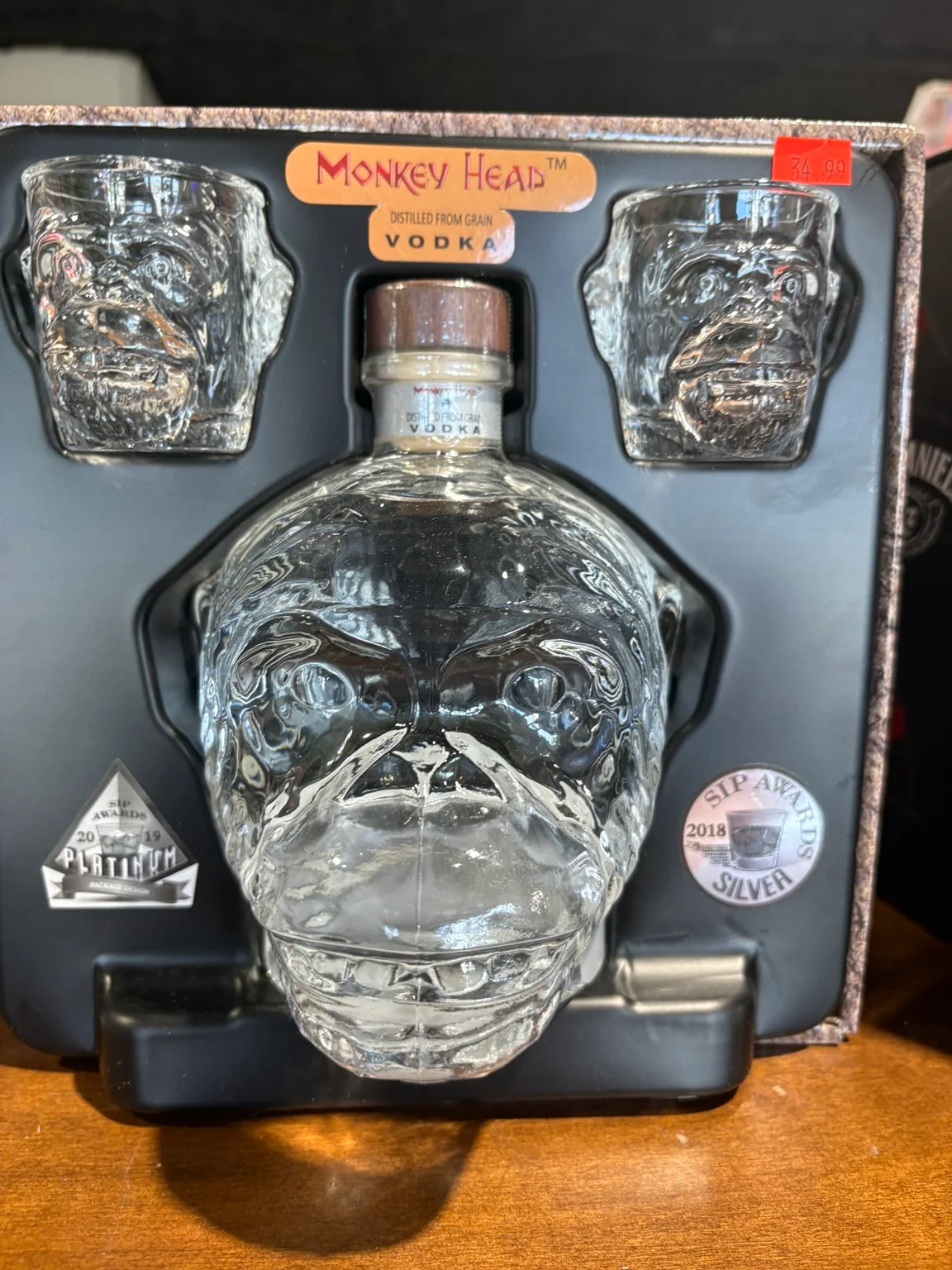 Monkey Head vodka gift set with a monkey-shaped bottle and two matching glasses at One Stop Liquor in Bethany, Oklahoma