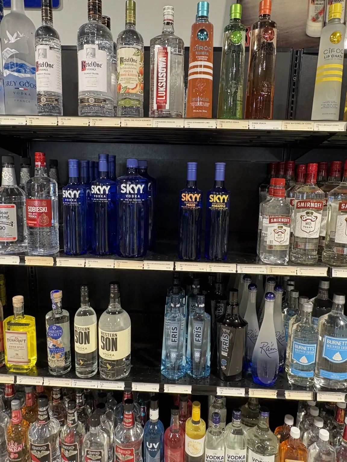 Premium vodka bottles above SKYY, Smirnoff, Three Olives and Burnett’s vodka at One Stop Liquor in Bethany, Oklahoma